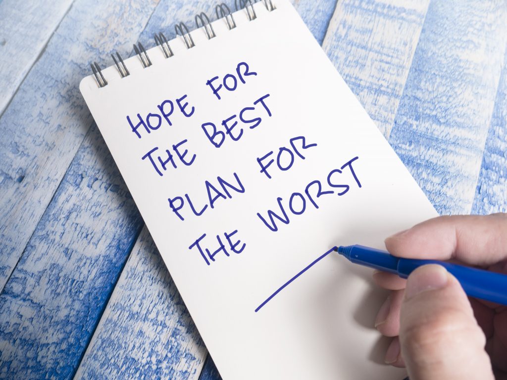 Hope for the best plan for the worst written on notepad