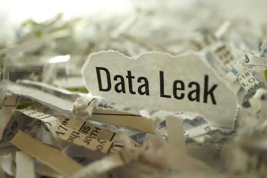 shredded paper with data leak written on paper scrap