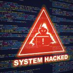 system hacked triangle and screens of code behind the triangle
